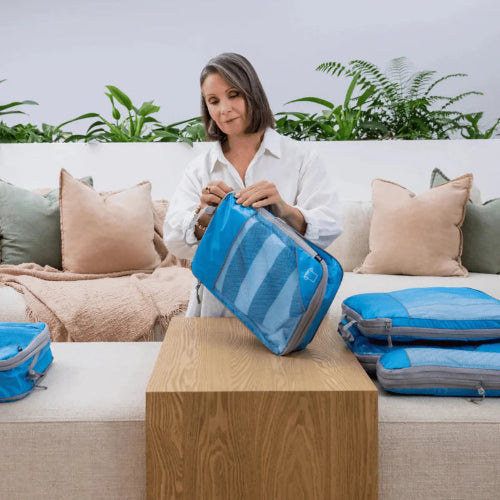 L'organisateur Compressible Pour Valise